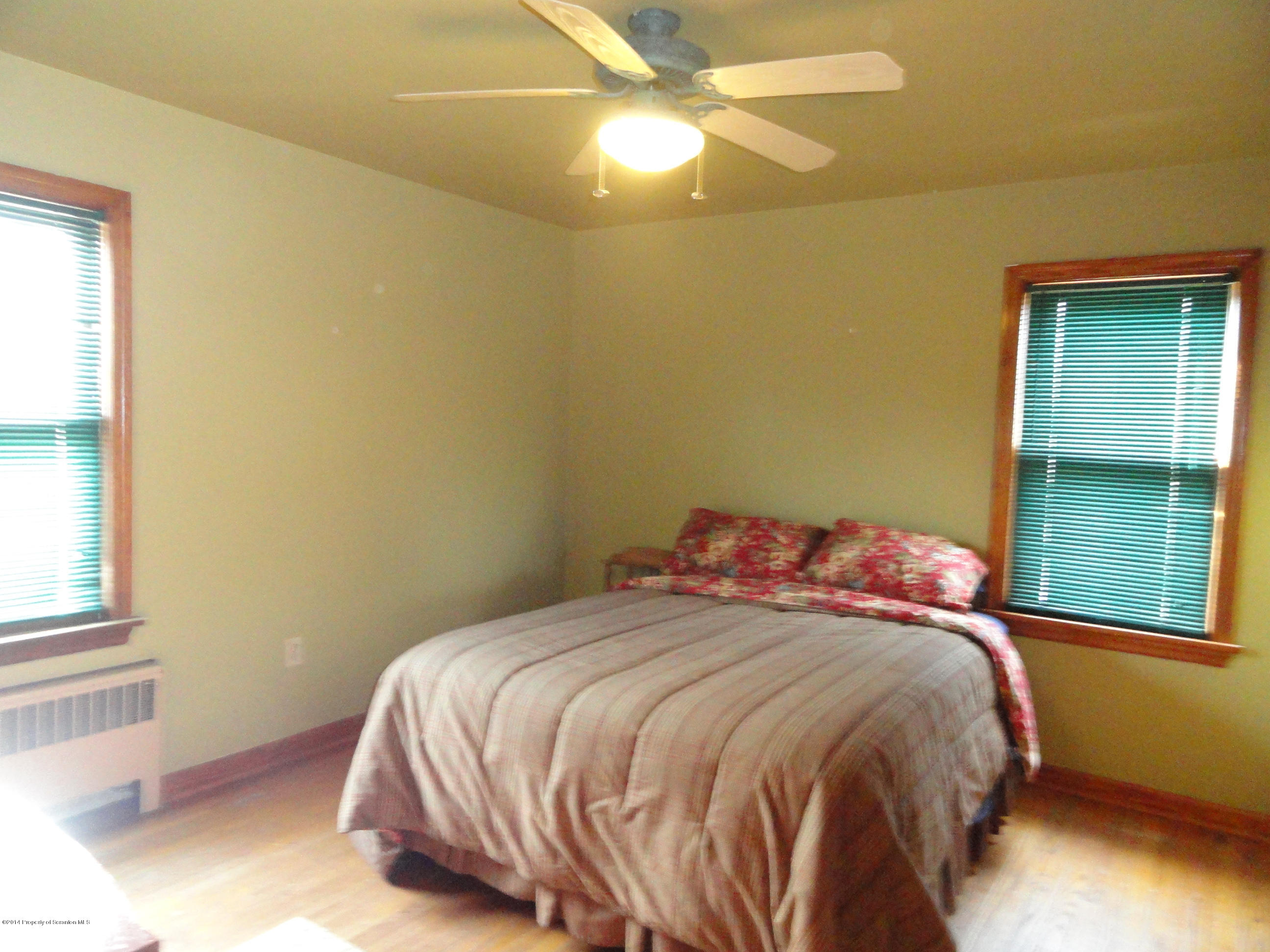 2310 Quicktown Road Moscow, PA 18444 - Photo 6 of 52 a bedroom with a bed and a window