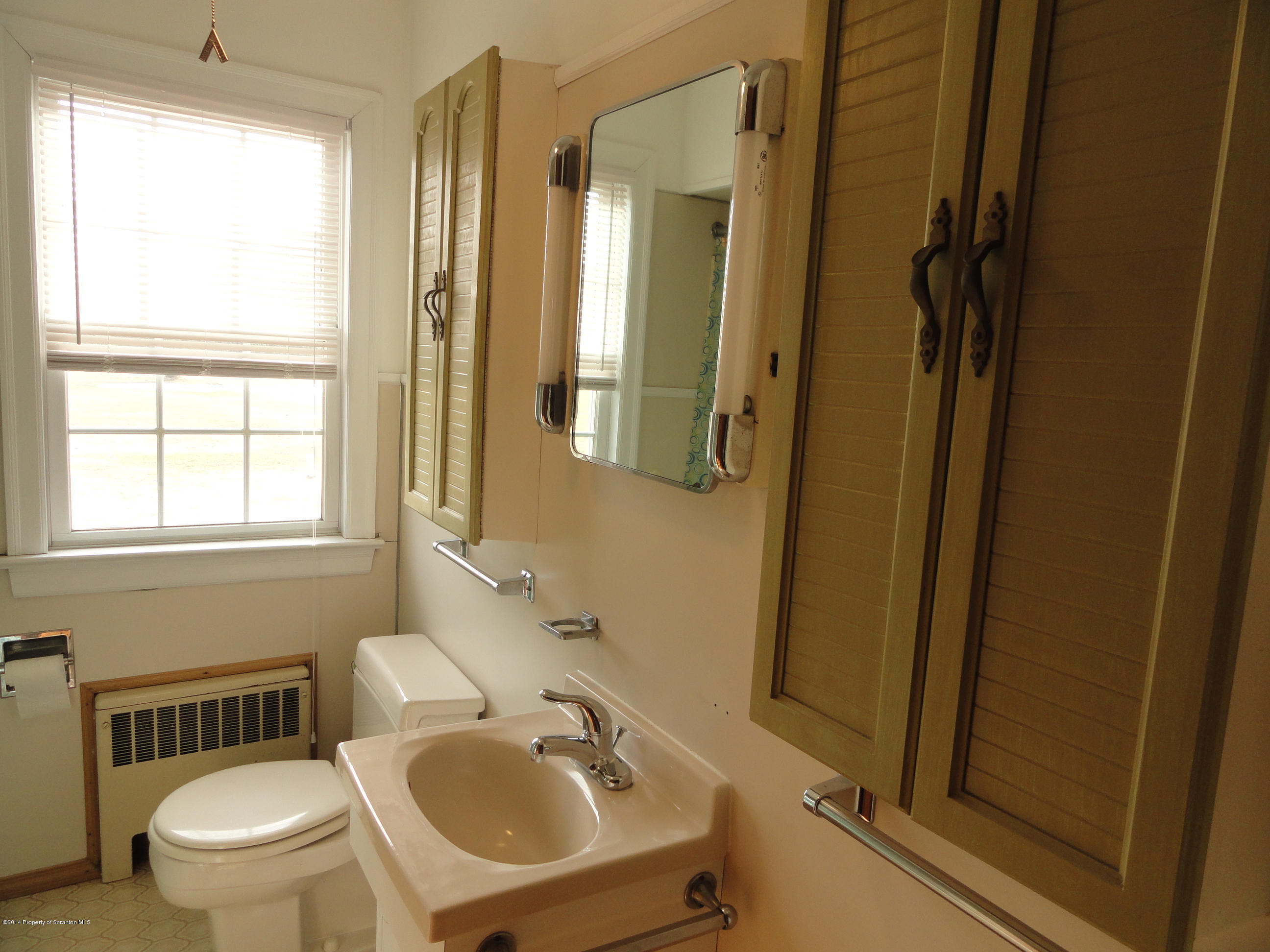 2310 Quicktown Road Moscow, PA 18444 - Photo 9 of 52 a bathroom with a sink toilet and shower