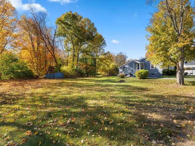 a view of house with swimming pool