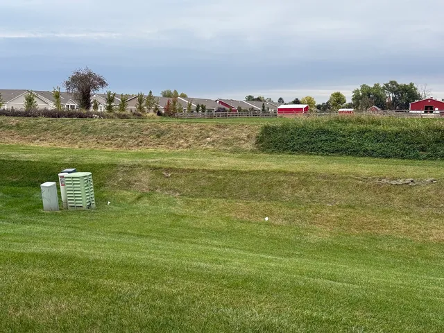 a view of a water fountain and an ocean view