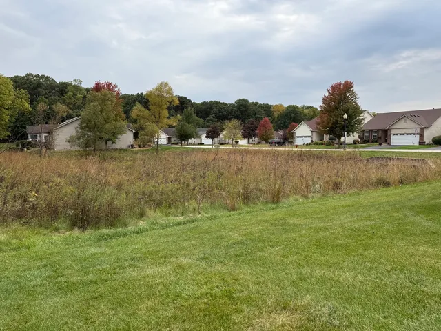 a view of lake and houses