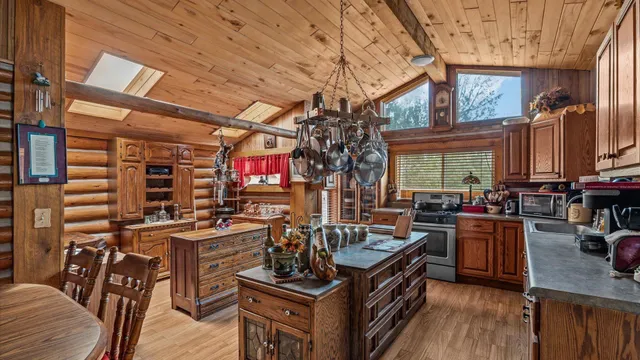 a view of a chairs and table in a patio