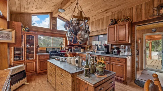 a view of a kitchen with seating area