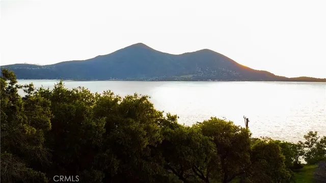 a view of a houses with a yard