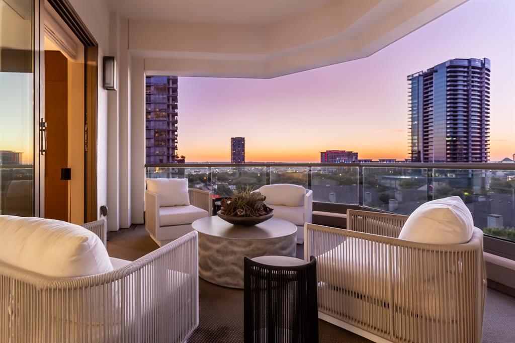 2300 Wolf Street, Unit 7D Dallas, TX 75201 - Photo 17 of 40 a roof deck with couch and city view