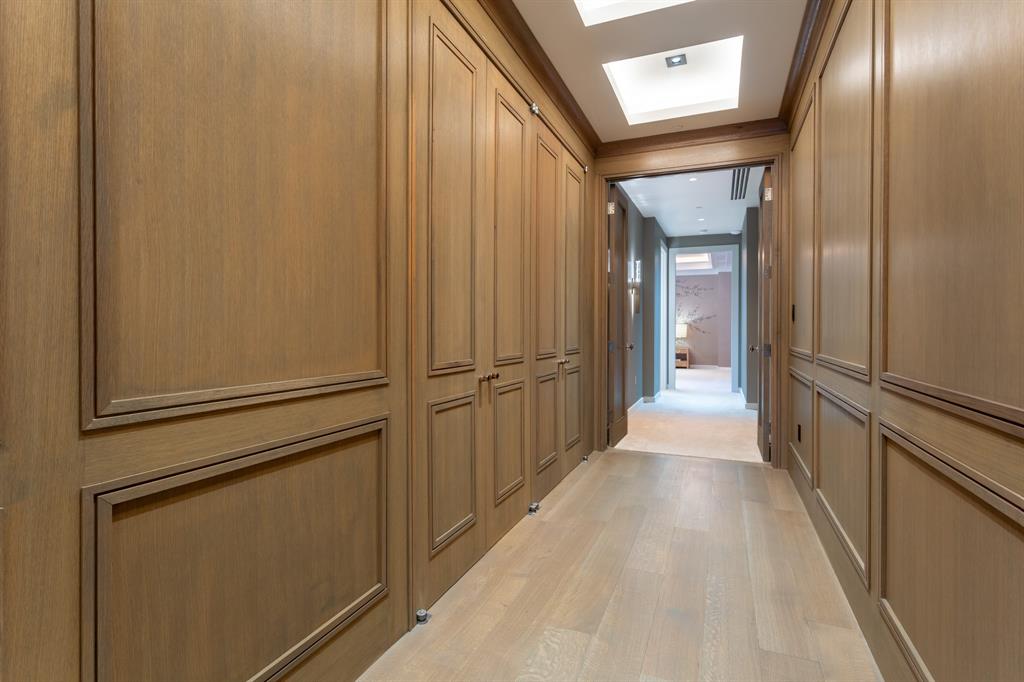 2300 Wolf Street, Unit 7D Dallas, TX 75201 - Photo 23 of 40 a view of a hallway with wooden floor