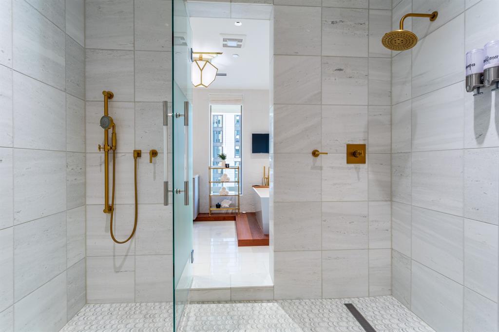 2300 Wolf Street, Unit 7D Dallas, TX 75201 - Photo 26 of 40 a bathroom with a shower