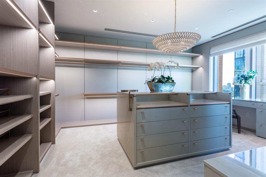 2300 Wolf Street, Unit 7D Dallas, TX 75201 - Photo 27 of 40 a view of room with window and cabinet