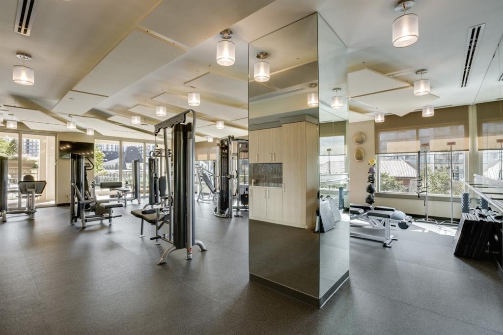 2300 Wolf Street, Unit 7D Dallas, TX 75201 - Photo 35 of 40 a view of a living room with gym equipment