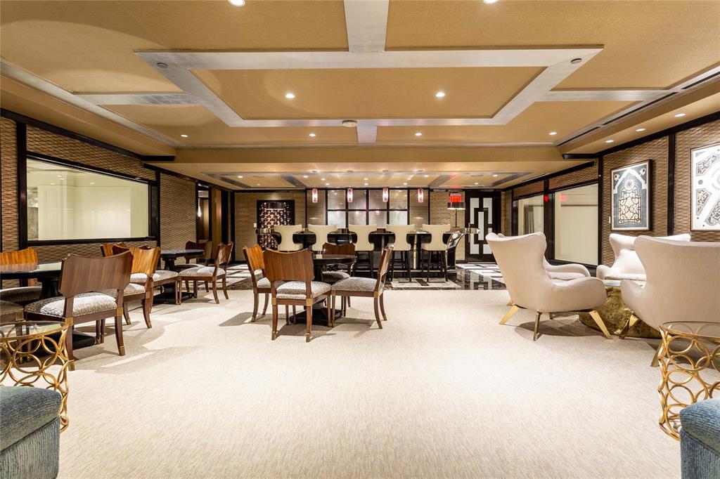 2300 Wolf Street, Unit 7D Dallas, TX 75201 - Photo 38 of 40 a living room with lots of furniture and white equipment