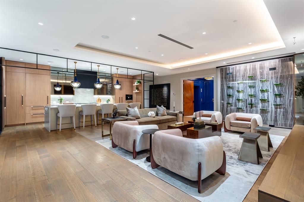 2300 Wolf Street, Unit 7D Dallas, TX 75201 - Photo 5 of 40 a living room with patio furniture and a large window