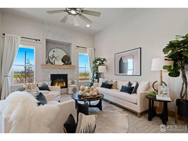 a living room with furniture kitchen and kitchen view