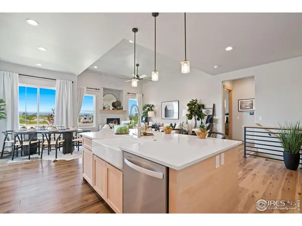 a view of a kitchen and dining room