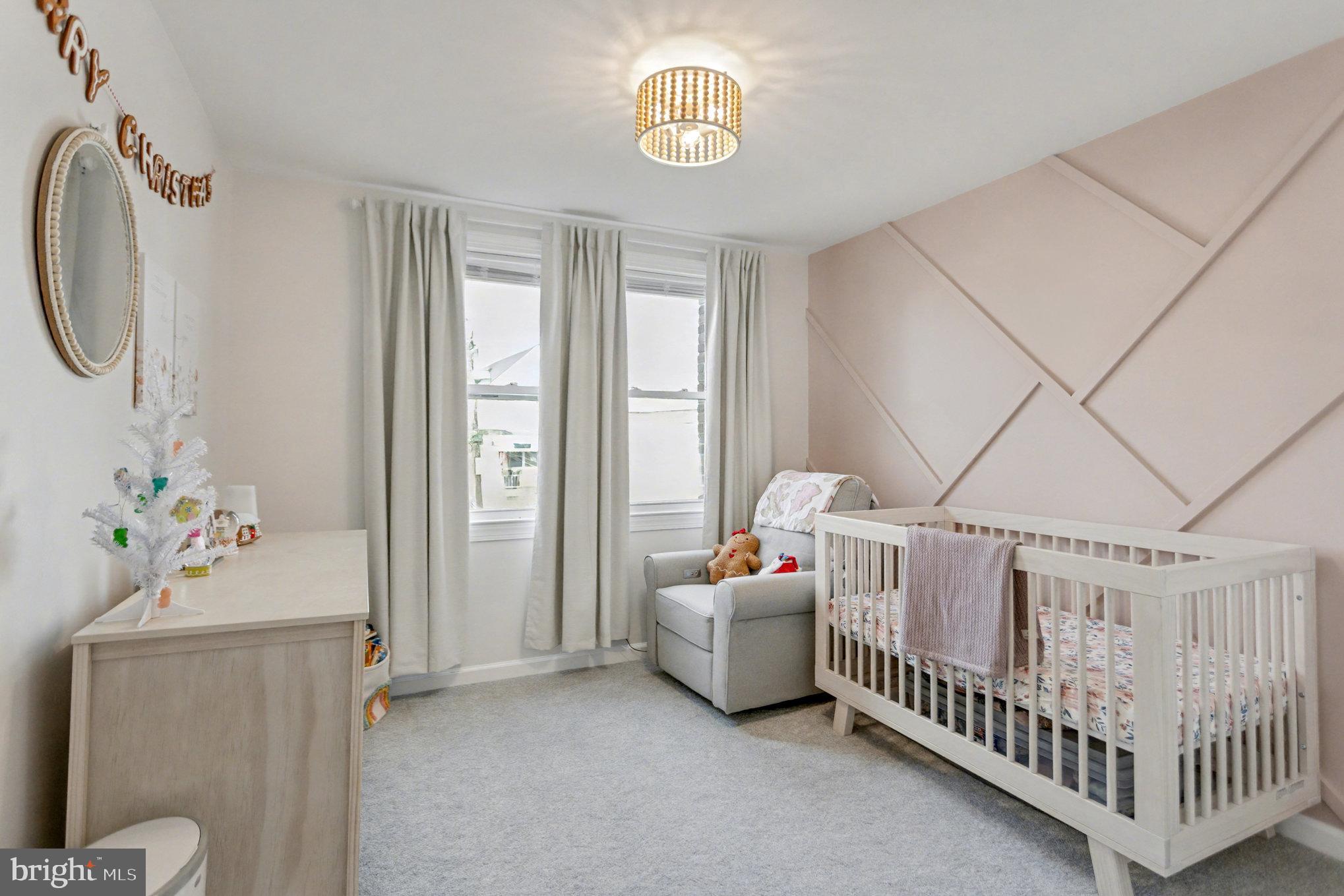 8656 Oak Road Baltimore, MD 21234 - Photo 13 of 30 a bedroom with furniture and a window