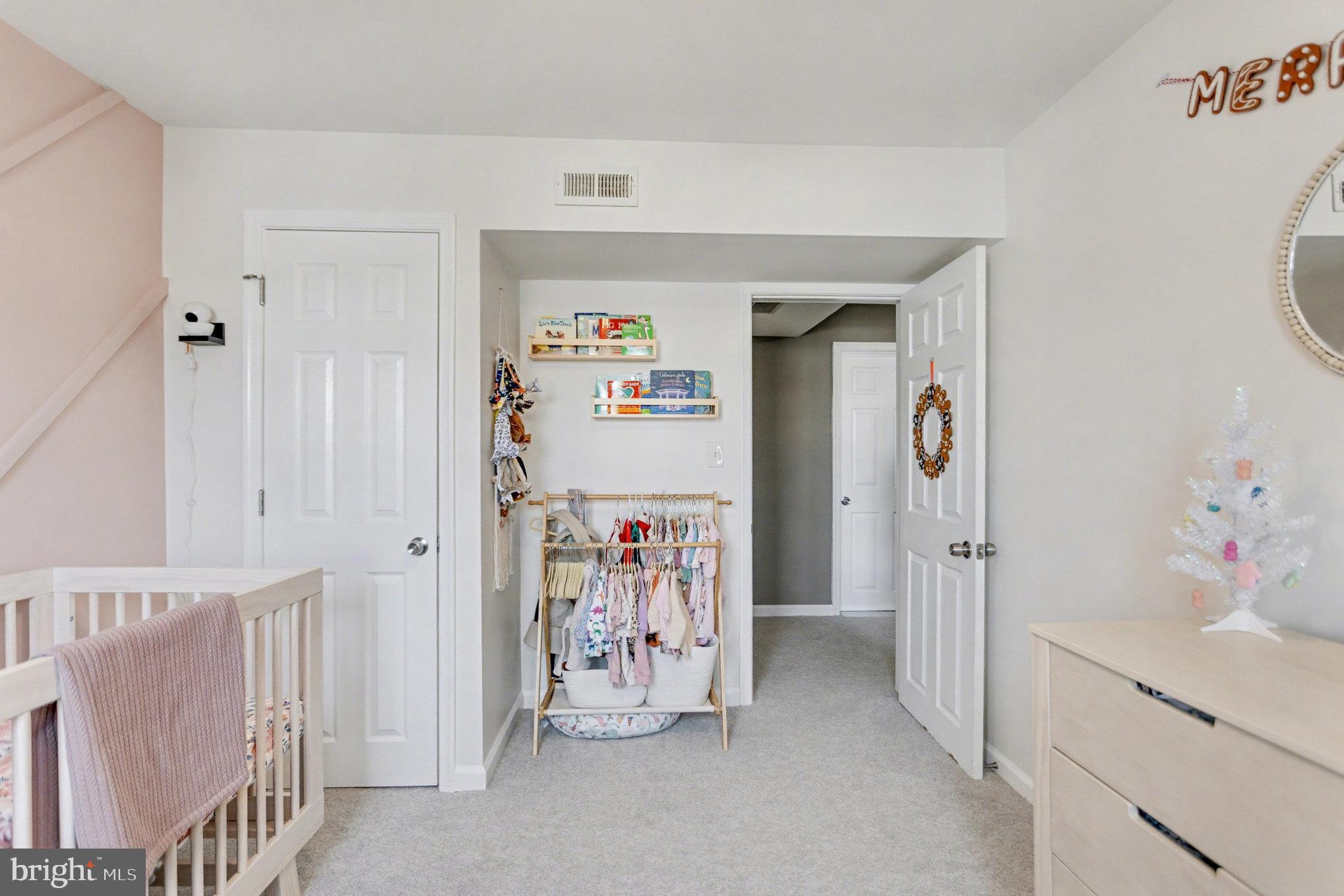 8656 Oak Road Baltimore, MD 21234 - Photo 14 of 30 a view of room with baby crib