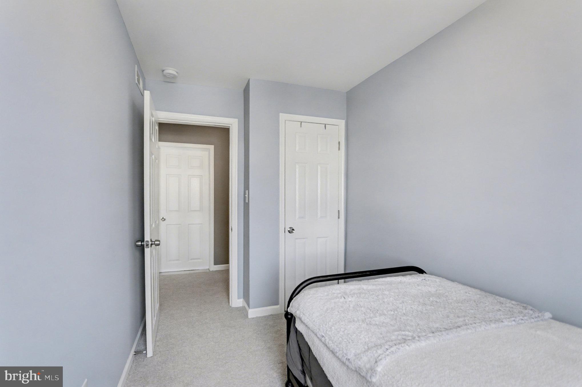 8656 Oak Road Baltimore, MD 21234 - Photo 16 of 30 a view of a room that has a bed in it