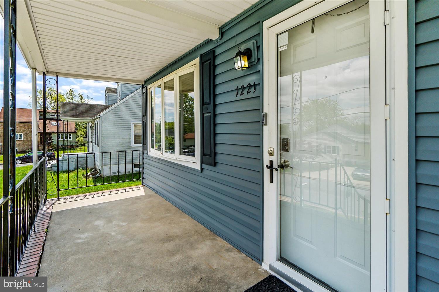 1221 Landover Road Baltimore, MD 21237 - Photo 4 of 31 Enjoy a Cup of Coffee on Your Covered Porch
