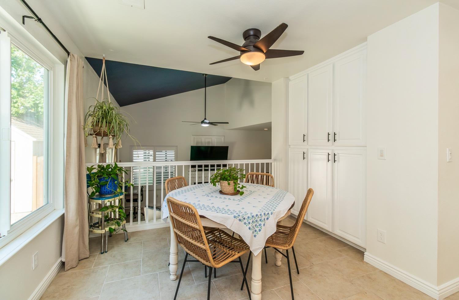 1323 Oak Avenue Clovis, CA 93611 - Photo 11 of 42 a view of a dining room with furniture window and outside view