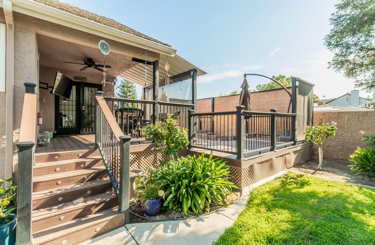 1323 Oak Avenue Clovis, CA 93611 - Photo 28 of 42 a view of staircase with a potted plant