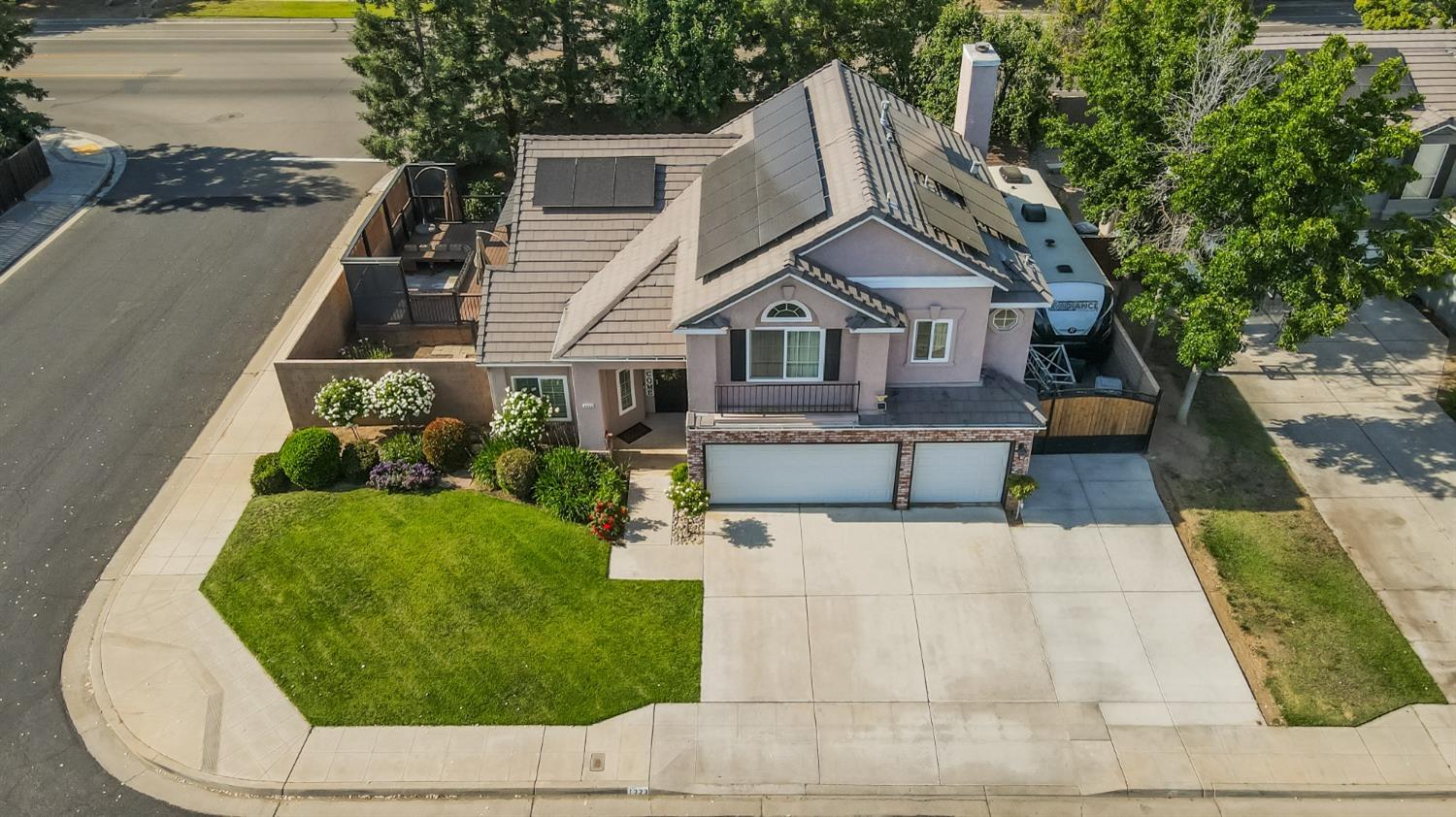 1323 Oak Avenue Clovis, CA 93611 - Photo 34 of 42 an aerial view of a house with a yard