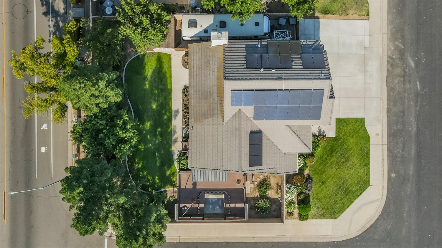 1323 Oak Avenue Clovis, CA 93611 - Photo 41 of 42 an aerial view of a house with a garden and plants