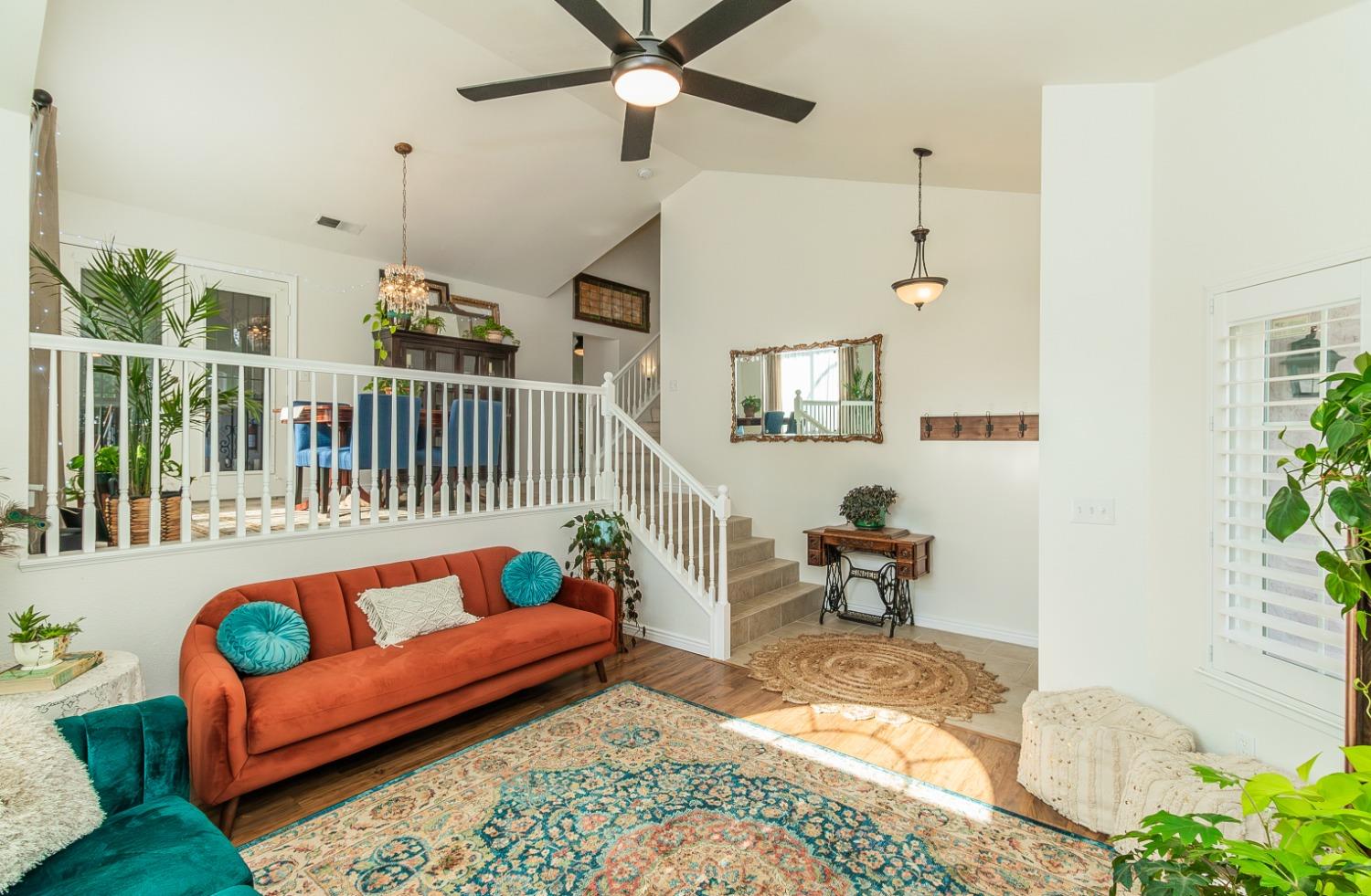 1323 Oak Avenue Clovis, CA 93611 - Photo 5 of 42 a bedroom with furniture and a rug