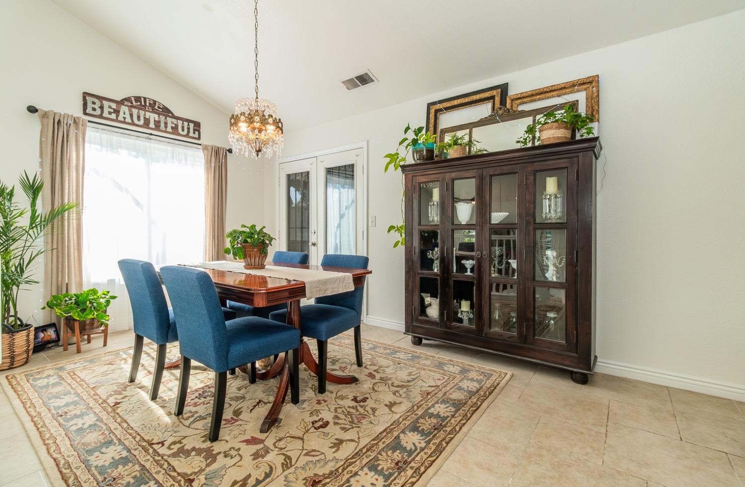 1323 Oak Avenue Clovis, CA 93611 - Photo 6 of 42 a view of a dining room with furniture