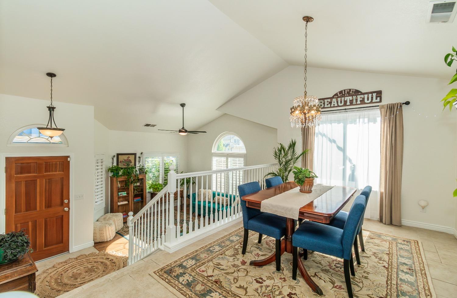 1323 Oak Avenue Clovis, CA 93611 - Photo 7 of 42 a view of a dining room with furniture window and wooden floor