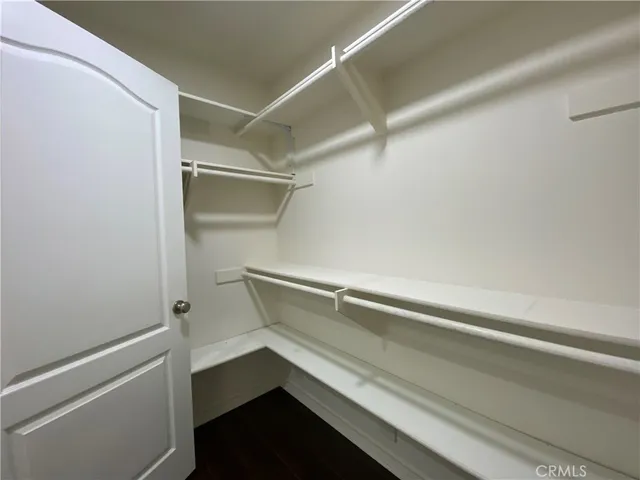 a view of an empty walk in closet