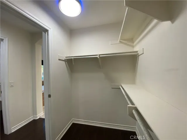 a large bathroom with a large tub and sink