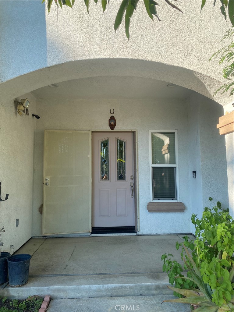 19303 Cohasset Street Reseda, CA 91335 - Photo 29 of 30 a front view of a house with a yard