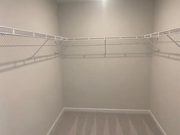 a view of a room with racks on the wall