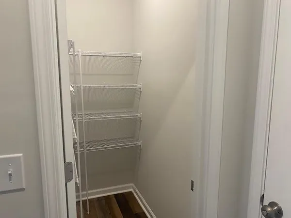 a bathroom with a glass door shower