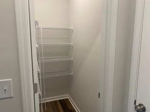 a bathroom with a glass door shower