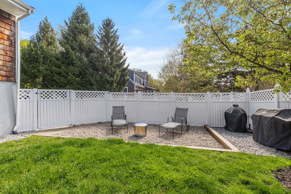 21 Linscott Road Hingham, MA 02043 - Photo 13 of 32 a view of a chairs and table in the back yard