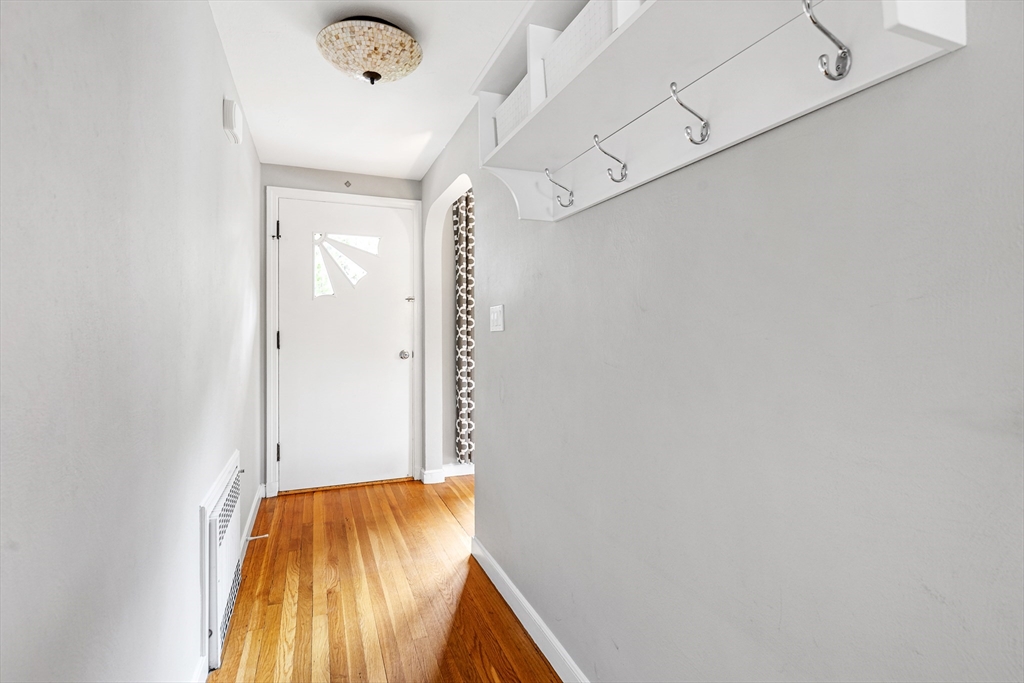 21 Linscott Road Hingham, MA 02043 - Photo 14 of 32 a bathroom with a granite countertop shower and a sink