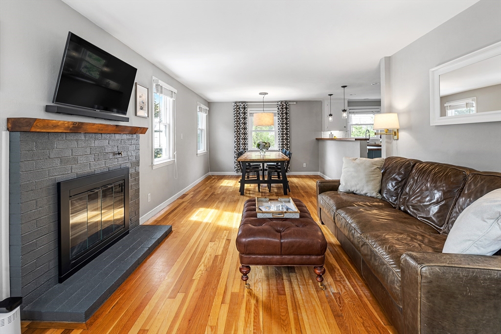 21 Linscott Road Hingham, MA 02043 - Photo 16 of 32 a living room with furniture and a fireplace