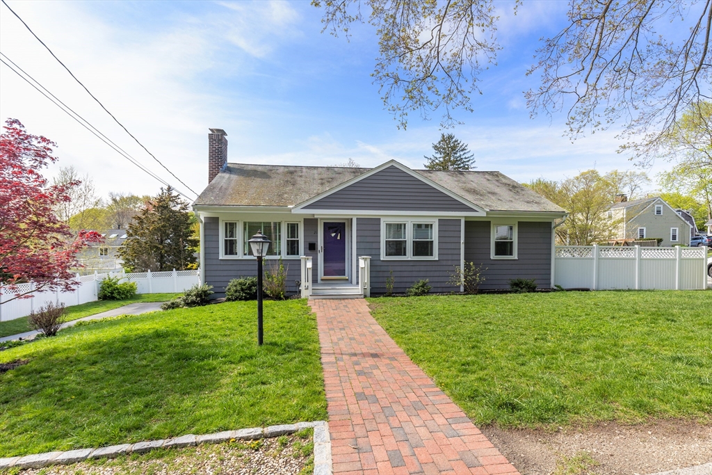 21 Linscott Road Hingham, MA 02043 - Photo 2 of 32 a front view of a house with a yard