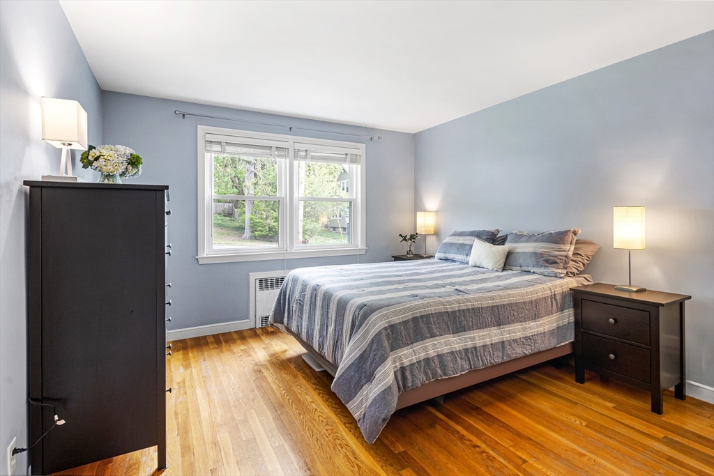 21 Linscott Road Hingham, MA 02043 - Photo 24 of 32 a bedroom with a bed and window