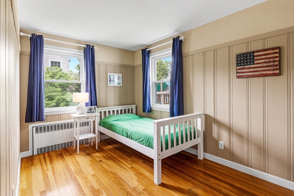 21 Linscott Road Hingham, MA 02043 - Photo 25 of 32 a bedroom with a bed and a window