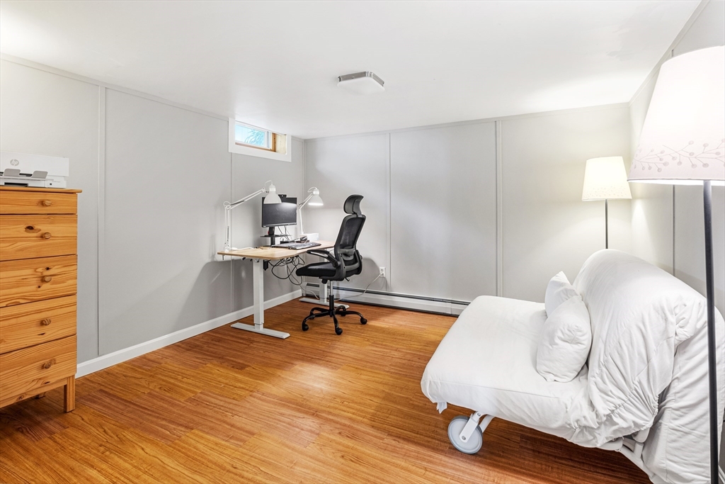 21 Linscott Road Hingham, MA 02043 - Photo 30 of 32 a view of a workspace with furniture and a wooden floor