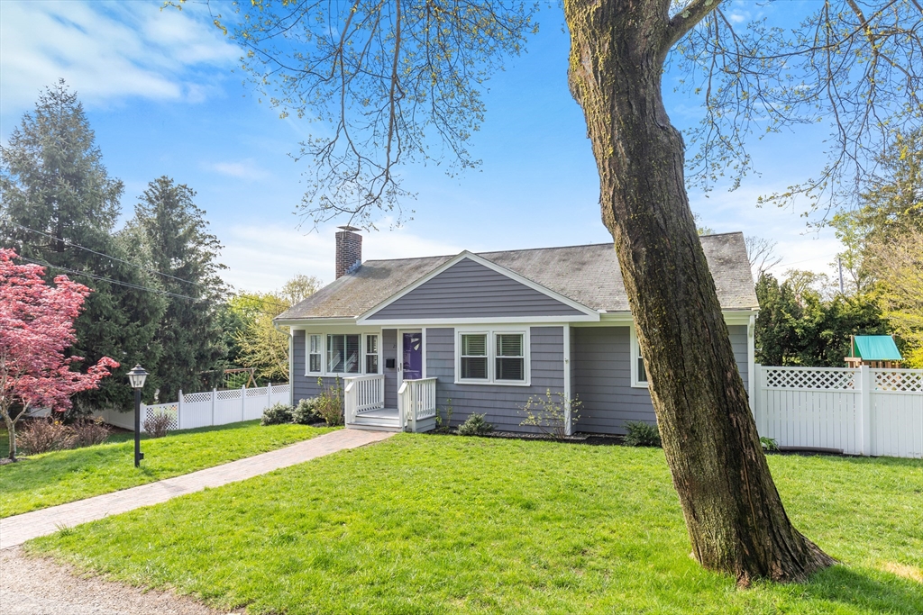 21 Linscott Road Hingham, MA 02043 - Photo 3 of 32 a front view of a house with a yard