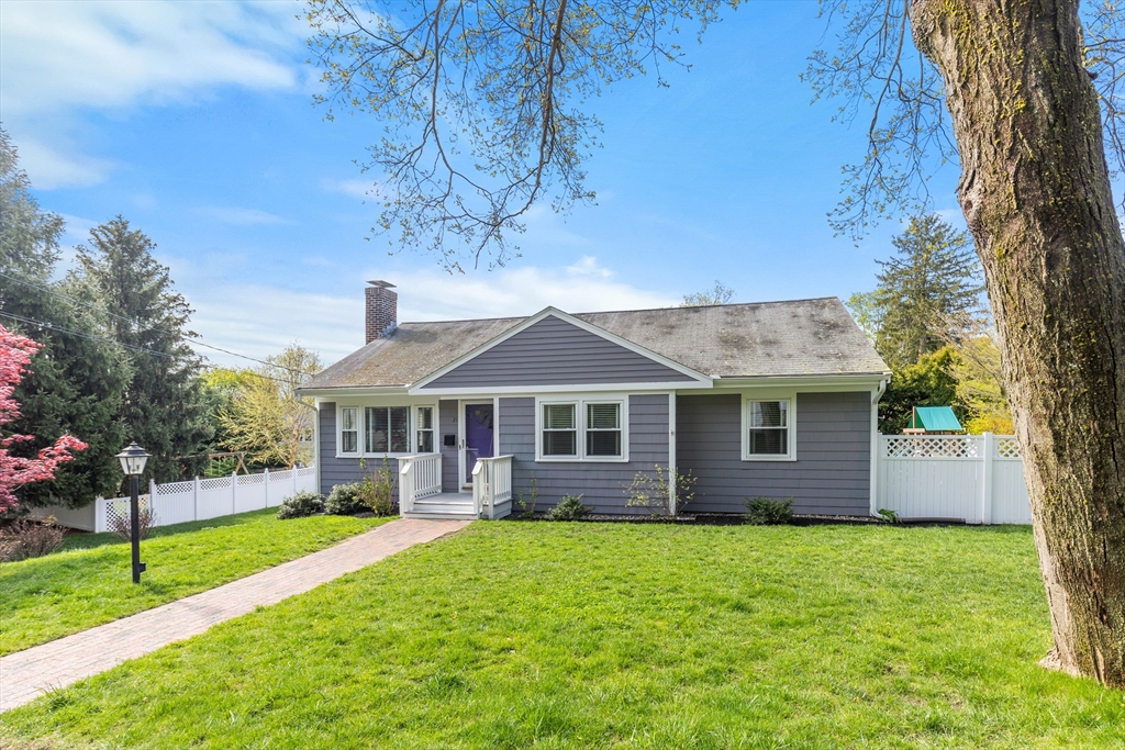21 Linscott Road Hingham, MA 02043 - Photo 4 of 32 a front view of a house with a yard