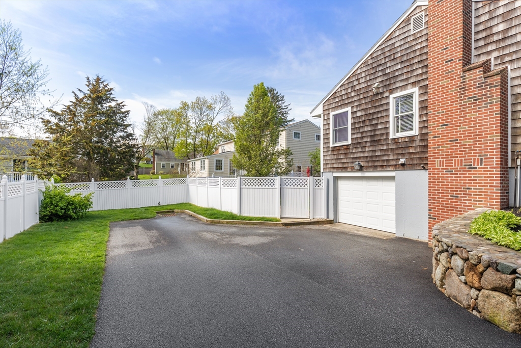 21 Linscott Road Hingham, MA 02043 - Photo 6 of 32 a view of backyard with tree