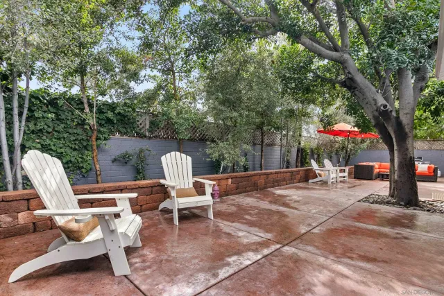 a view of a chairs and tables in the patio