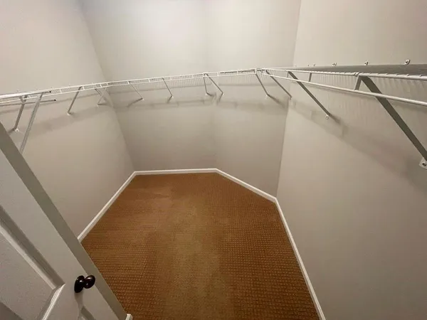 a view of a room with racks on the wall