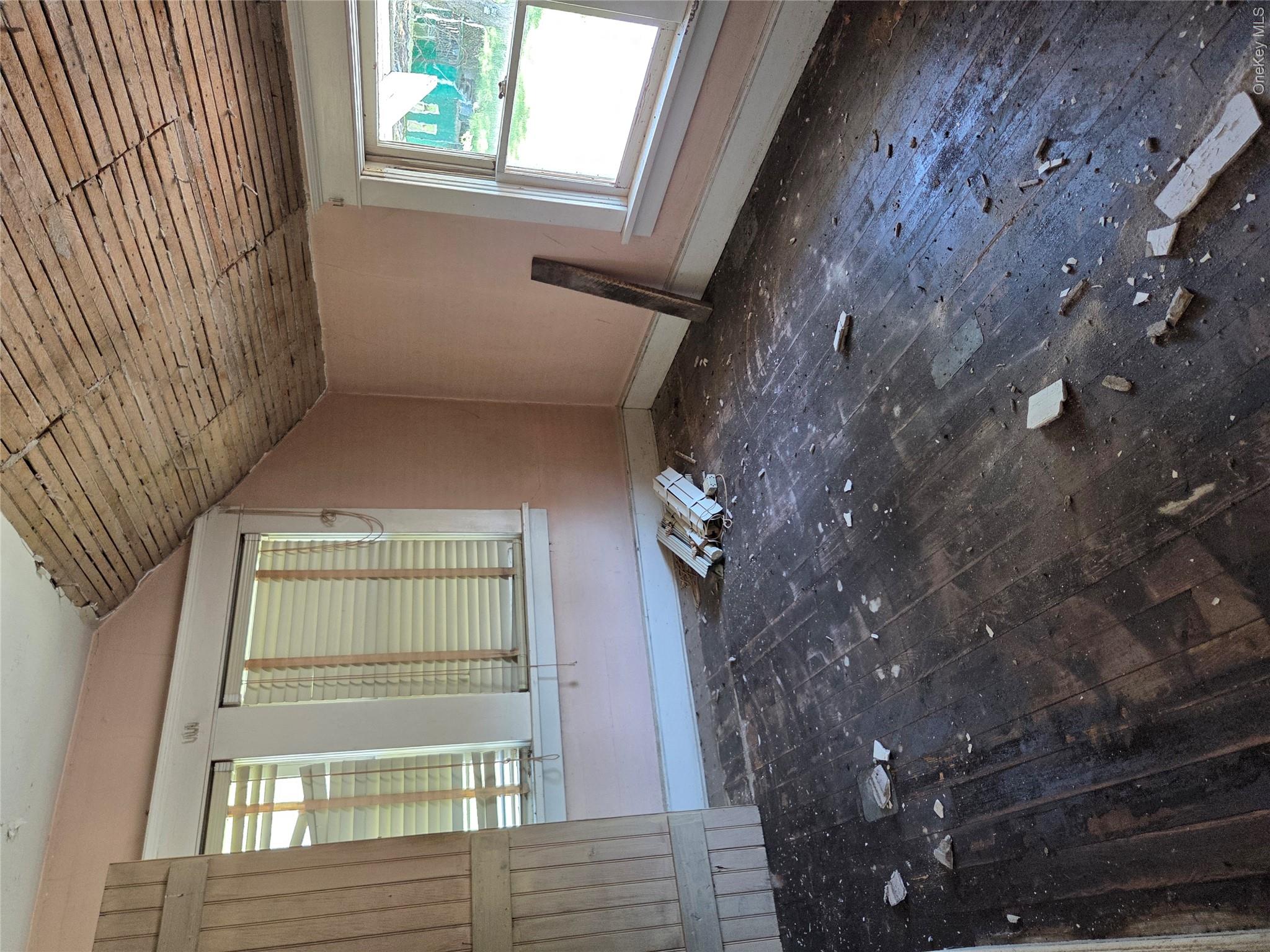 125 Zimmerman Road Loch Sheldrake, NY 12759 - Photo 34 of 43 a view of an empty room with a window