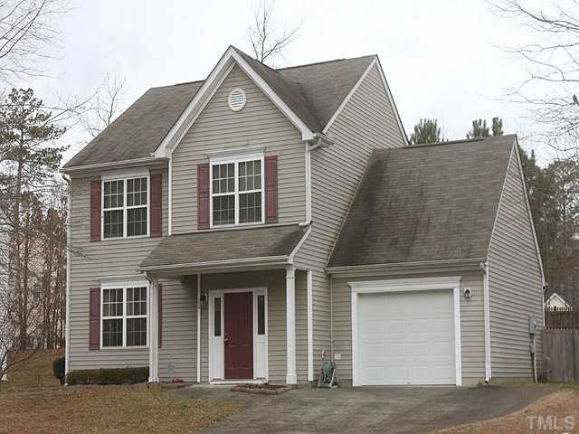 429 Hay River Street Garner, NC 27529 - Photo 1 of 12 a front view of a house with a garage