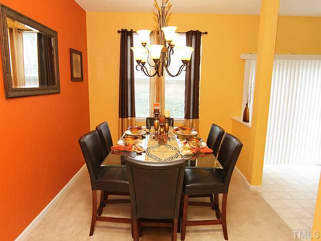 429 Hay River Street Garner, NC 27529 - Photo 4 of 12 a dining room with furniture and window