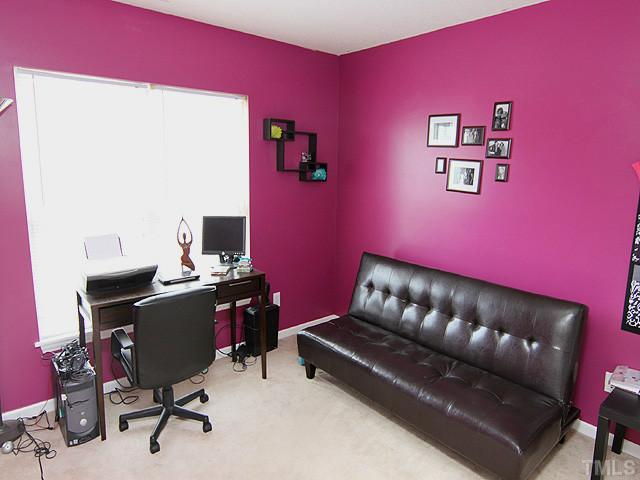429 Hay River Street Garner, NC 27529 - Photo 10 of 12 a living room with furniture and a desk